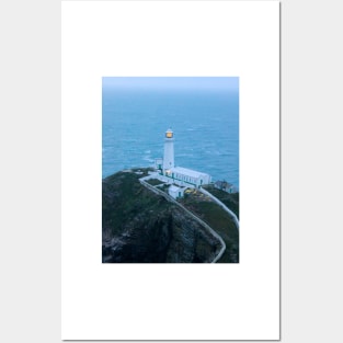 Welsh lighthouse on a stormy evening Posters and Art